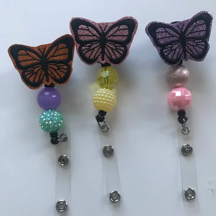 Butterfly Badge Reel – Bonitas Wholesale